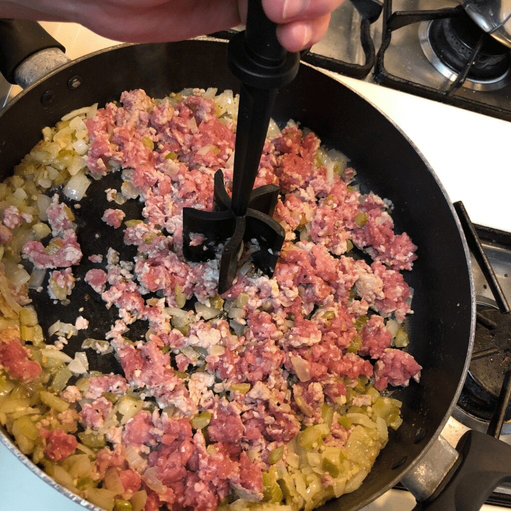 Cooking Sausage onion and celery