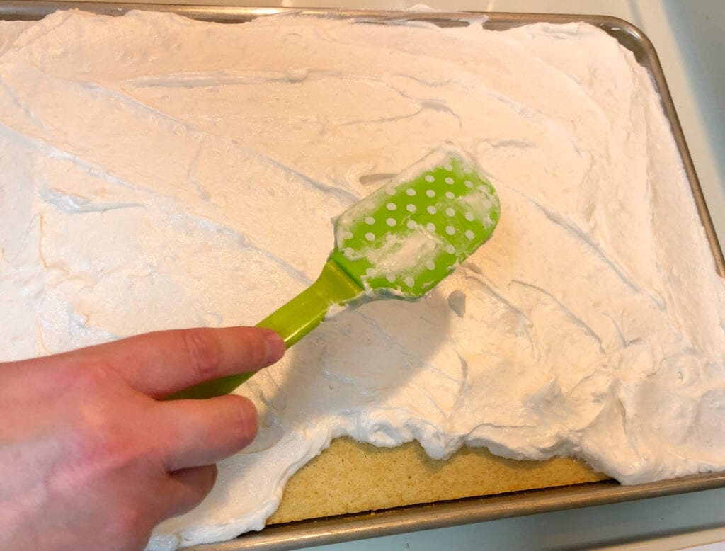 Slicing the Sheet Pan White Cake