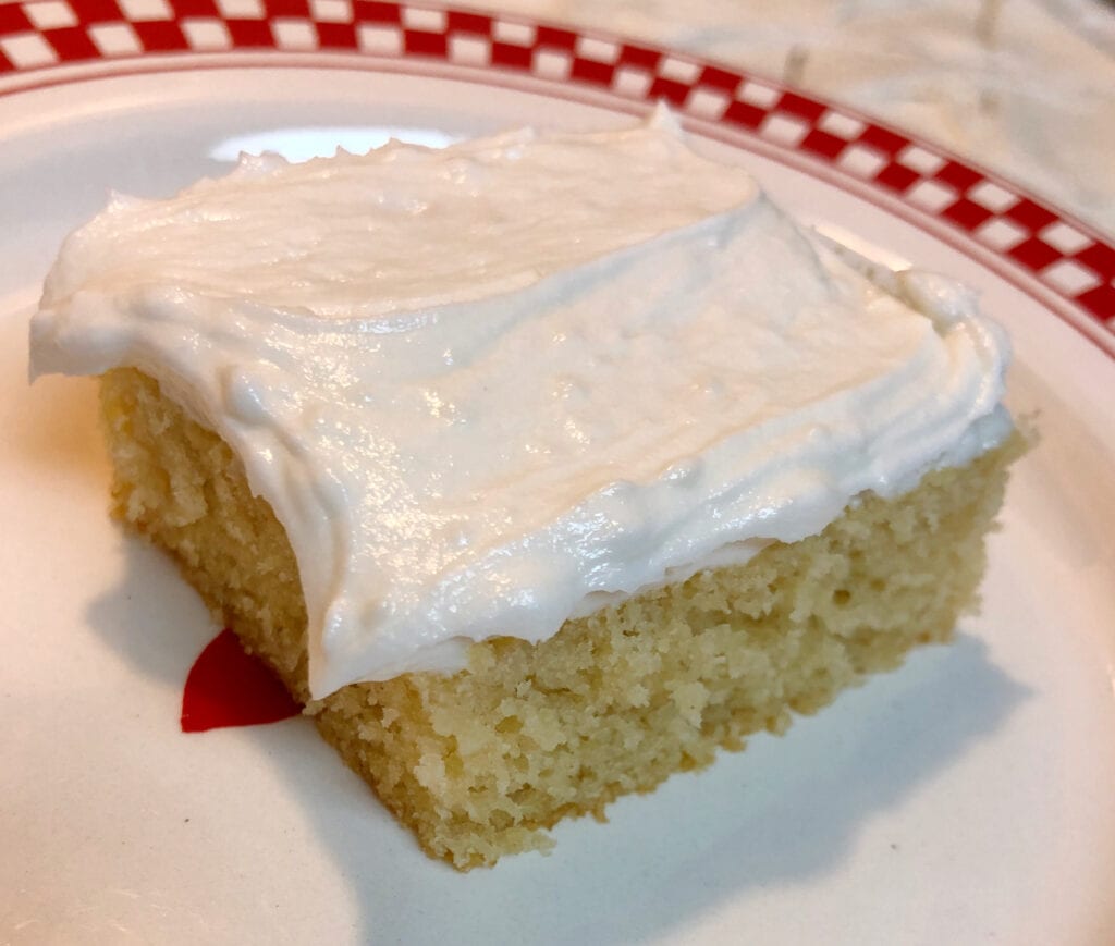 Vanilla Buttercream Frosting on White Cake