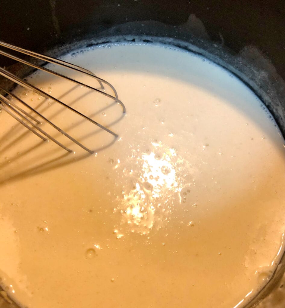 Whisking in the Milk for the Roux