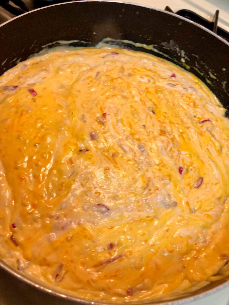 Making the Creamy Cheese Sauce