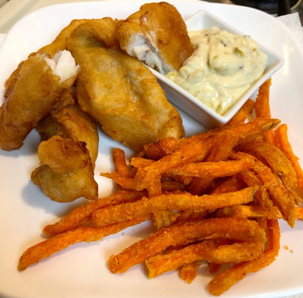 Pub Style Beer Battered Fish Meal with sweet potatoes and tartar sauce 