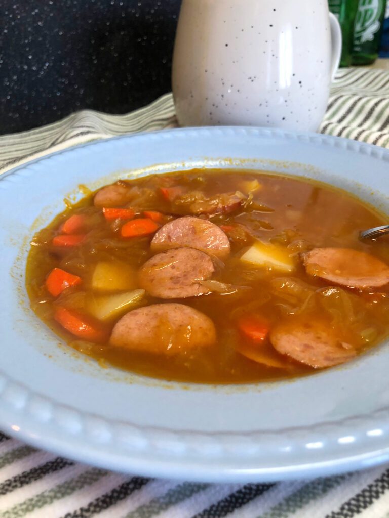 Sauerkraut and Sausage Soup in Bowl