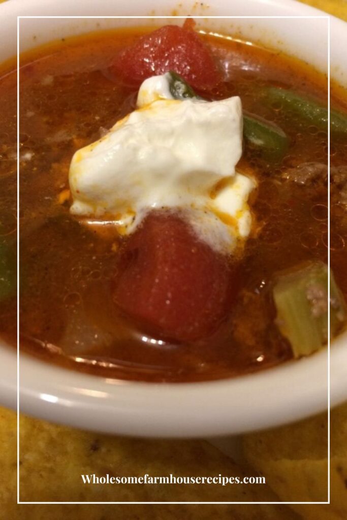 Tomato soup served with dollop of sour cream