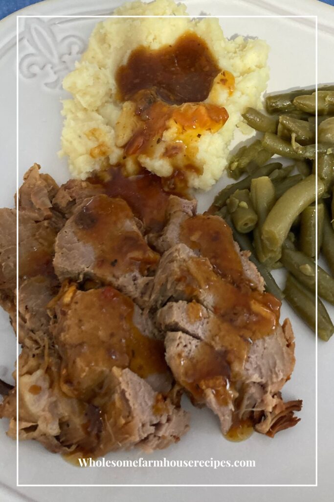 Roast Pork Dinner with mashed potatoes and green beans