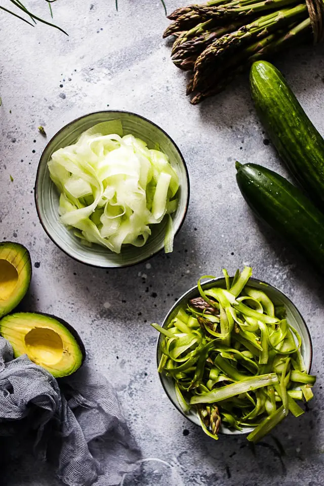 Shaved-Asparagus-and-Shaved-Cucumber-in-Bowls-next-to-Asparagus-Avocados-and-Cucumbers.jpg